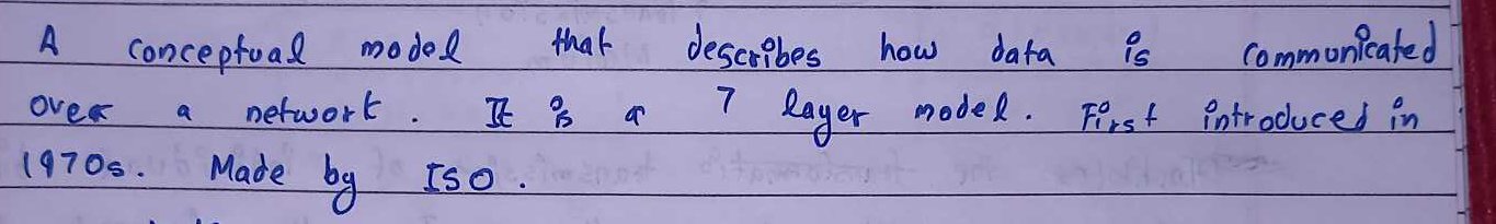Photo of handwritten notes in blue ballpoint: A conceptual model that describes how data is communicated over a network. It is a 7 layer model. First introduced in 1970s. Made by ISO.